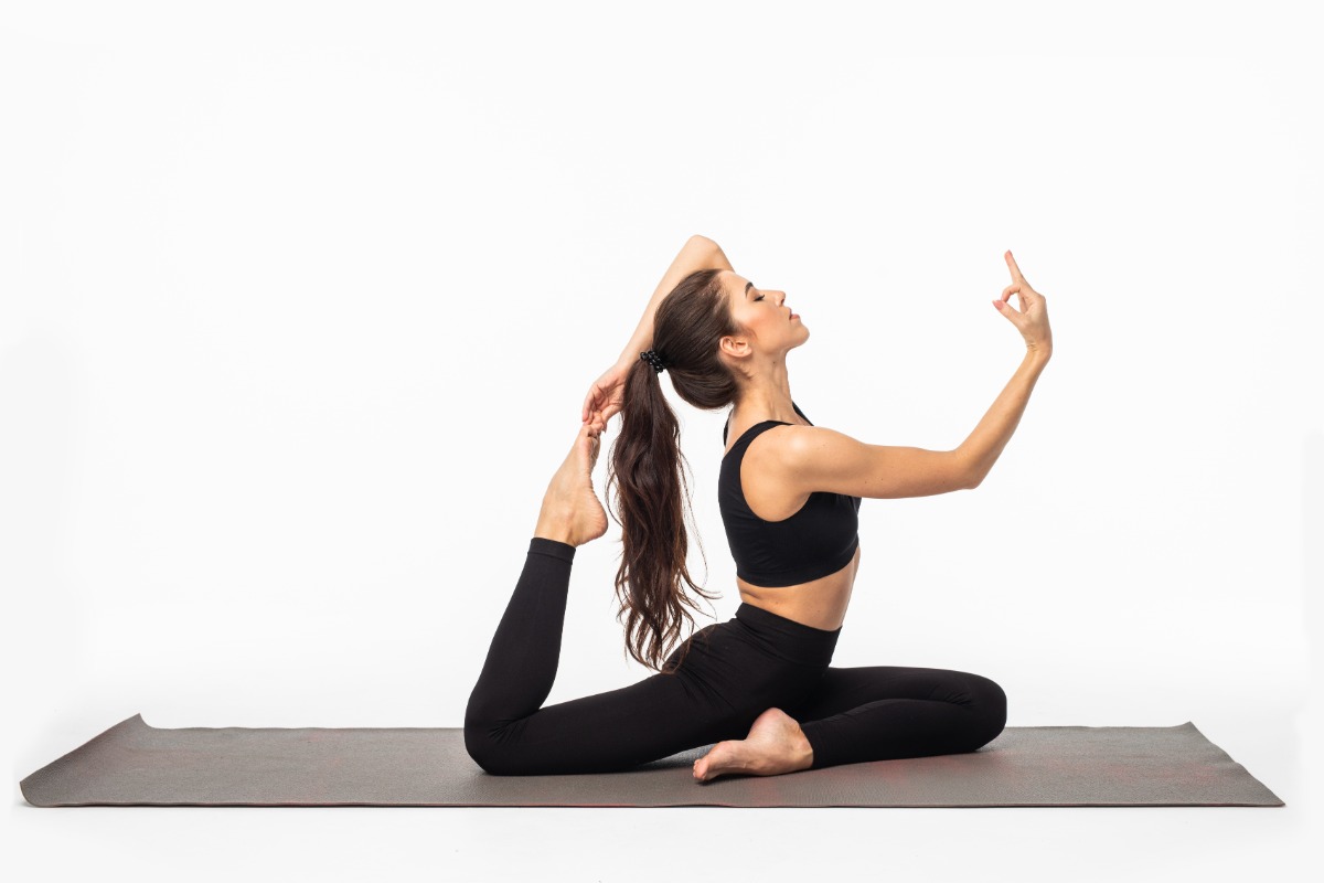sporty-young-woman-doing-yoga-practice-isolated-white-surface-concept-healthy-life-natural-balance-body-mental-development.jpg
